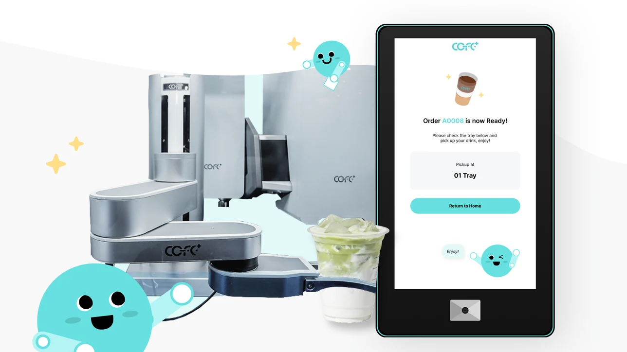 The COFE+ robot barista arm beside the pickup kiosk
